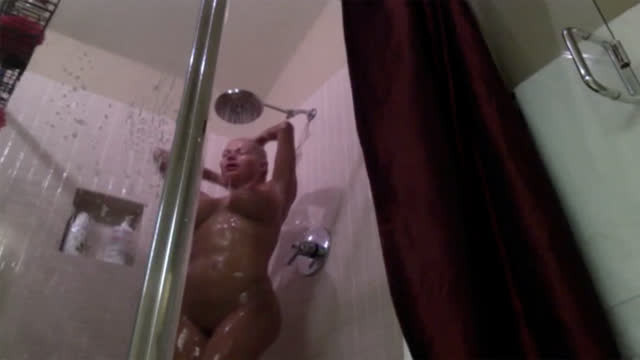 Thumbnail of Nikita takes a hot shower