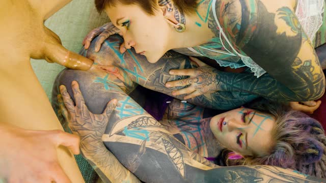 Thumbnail of 2 heavy tattoo girls get ass fucked by a big dick